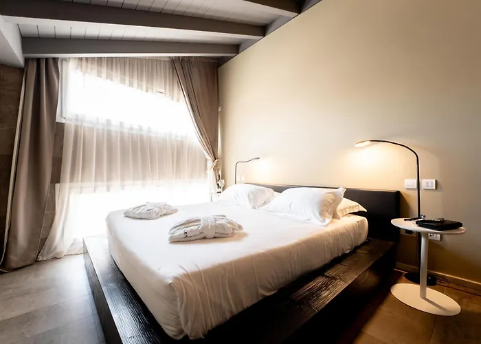 Отель Neko Boutique Кальяри