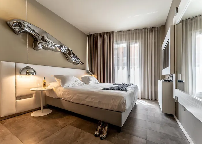 Отель Neko Boutique Кальяри